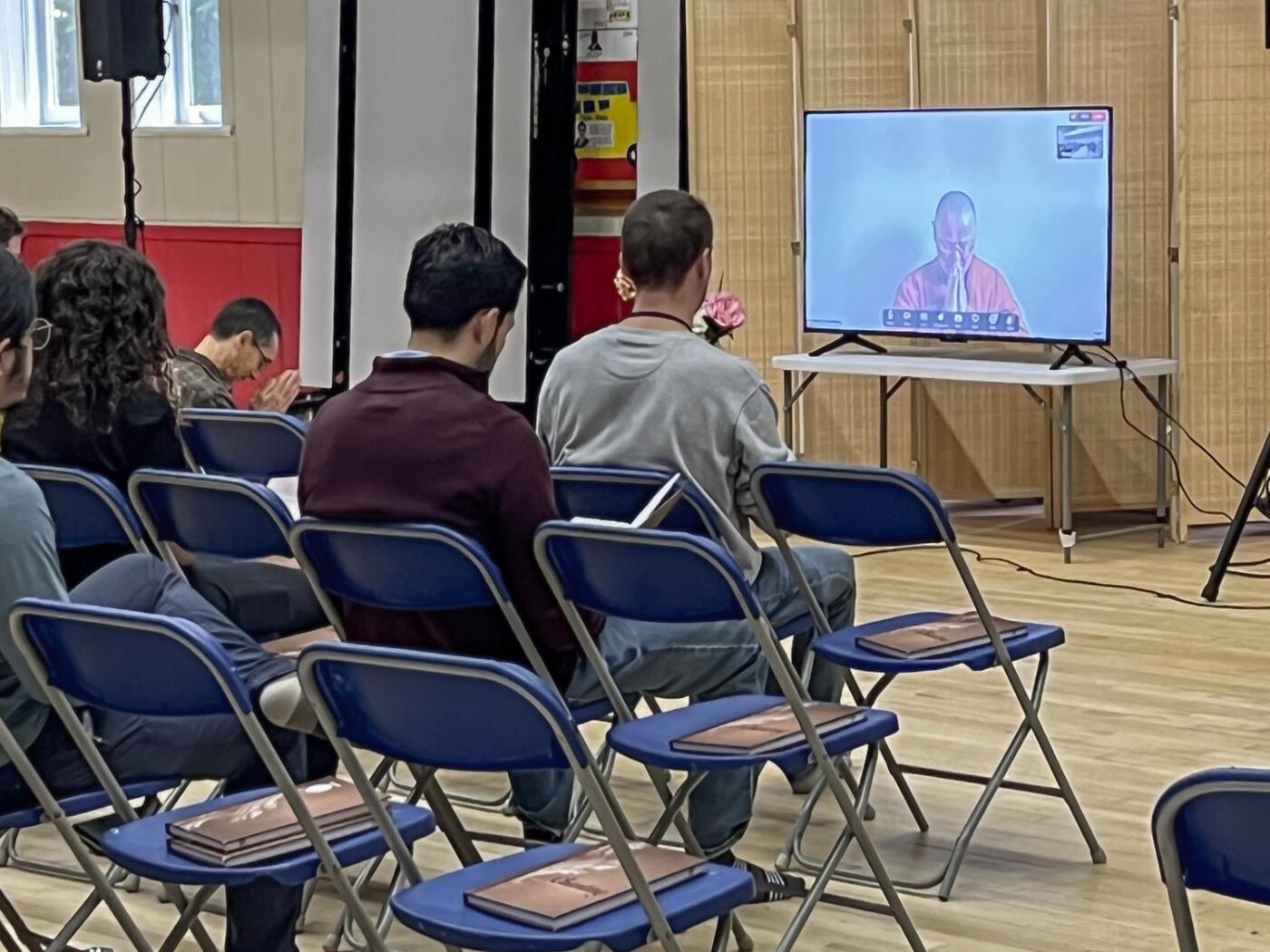 Ayya Brahmavara leads a Saturday gathering in Skinner auditorium, while our Ajahns are away