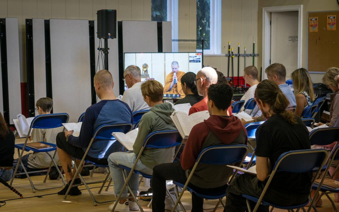 Lay practitioners at a Saturday gathering in Skinner auditorium